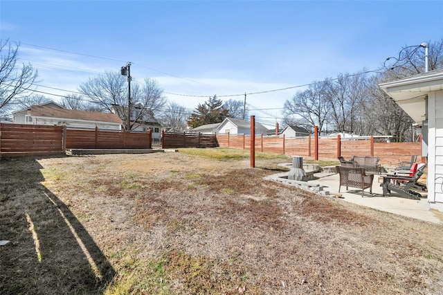 view of yard featuring a patio area and a fenced backyard