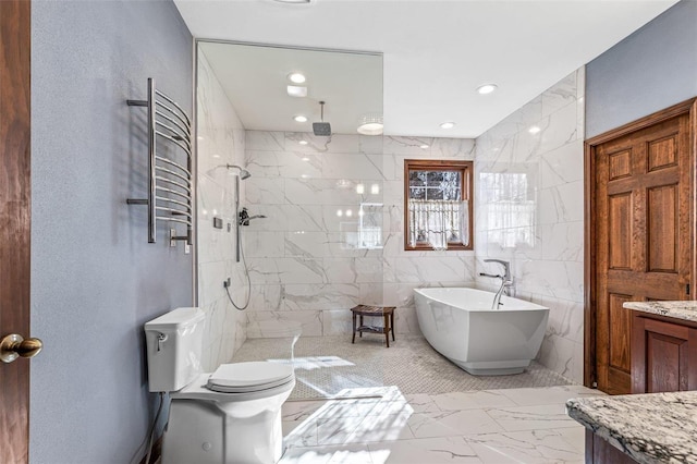 full bath with a freestanding tub, recessed lighting, a walk in shower, toilet, and marble finish floor