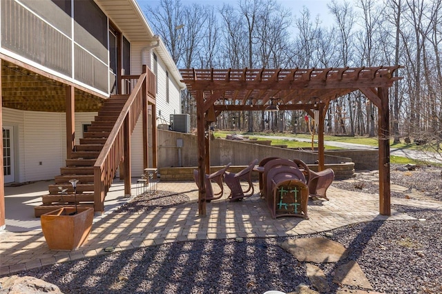 view of patio / terrace featuring stairway, cooling unit, a pergola, and a sunroom