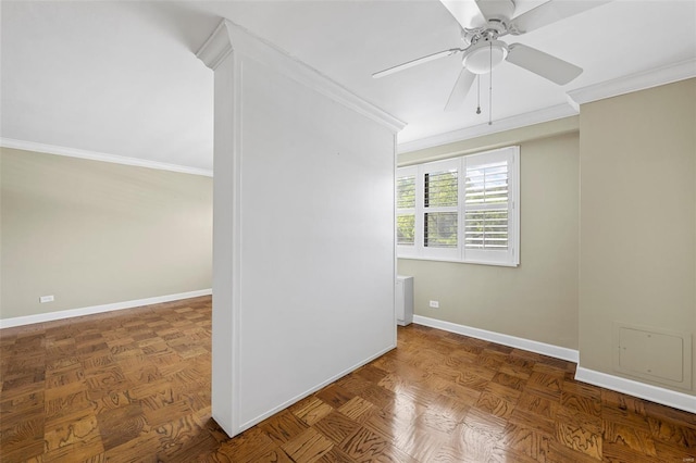 unfurnished room featuring crown molding, baseboards, and ceiling fan