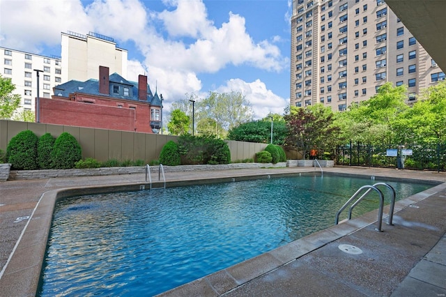 community pool with fence