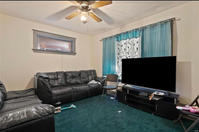 carpeted living area with ceiling fan