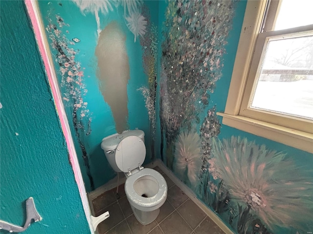 bathroom with tile patterned floors and toilet