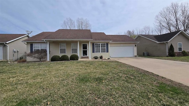 single story home featuring central AC unit, an attached garage, concrete driveway, and a front yard