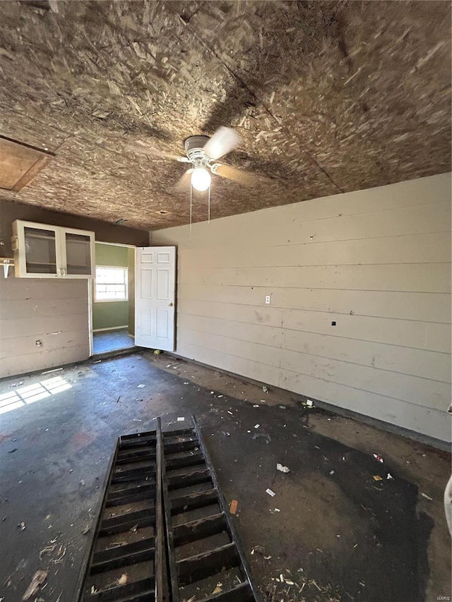 spare room with a ceiling fan