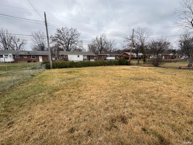 view of yard featuring fence