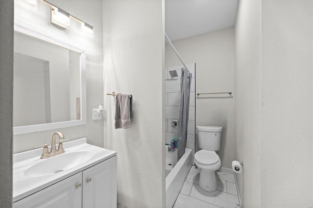 full bath featuring toilet, marble finish floor, baseboards, walk in shower, and vanity