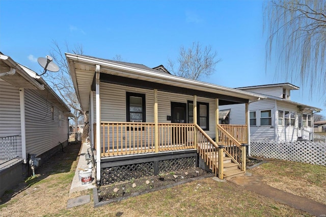 view of front of home featuring covered porch