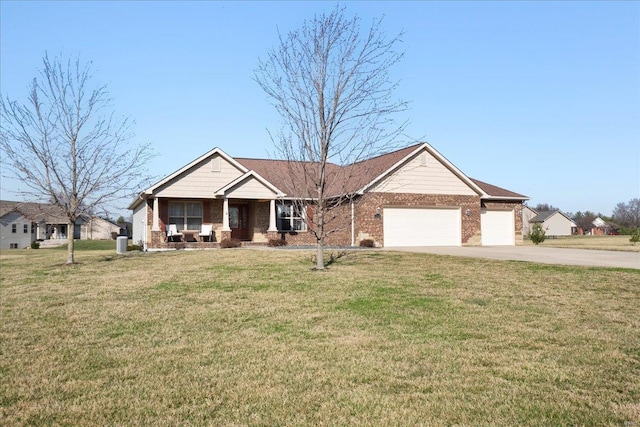 single story home featuring brick siding, driveway, a front lawn, and an attached garage