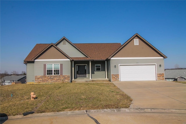 craftsman inspired home with a front yard, a shingled roof, concrete driveway, a garage, and stone siding