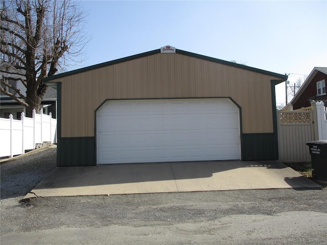 detached garage with fence