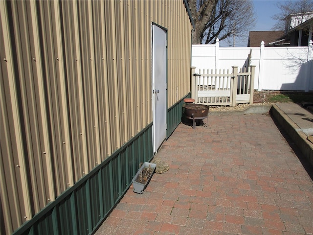 view of patio / terrace featuring fence