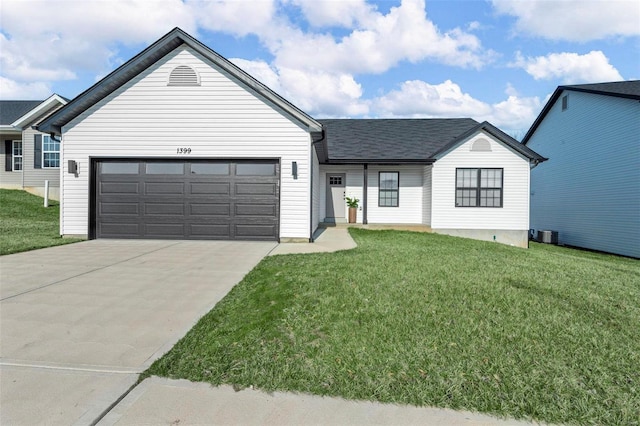 ranch-style home with driveway, a front yard, and an attached garage