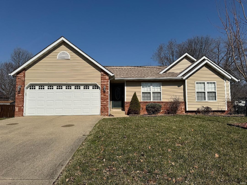 single story home featuring brick siding, a shingled roof, a front lawn, a garage, and driveway