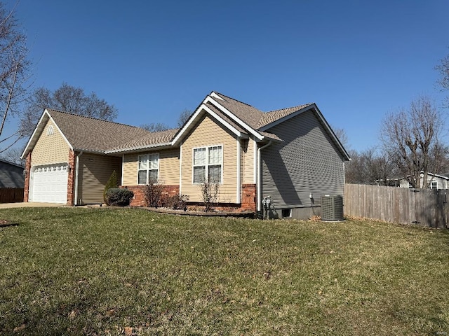 ranch-style house featuring brick siding, a front lawn, fence, central air condition unit, and an attached garage