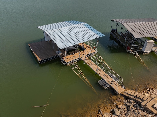 dock area featuring a water view