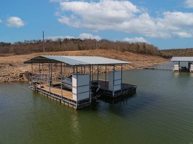 view of dock with a water view