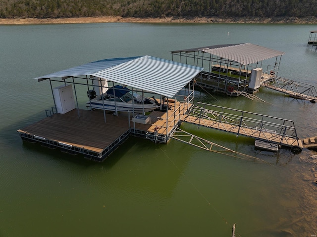 dock area featuring a water view and boat lift