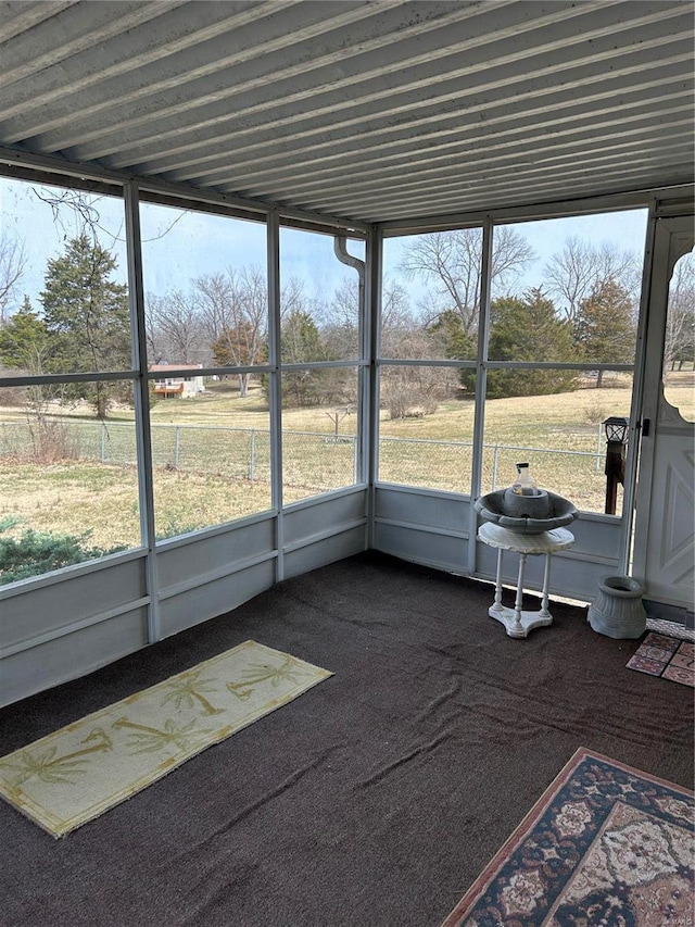 unfurnished sunroom featuring a healthy amount of sunlight