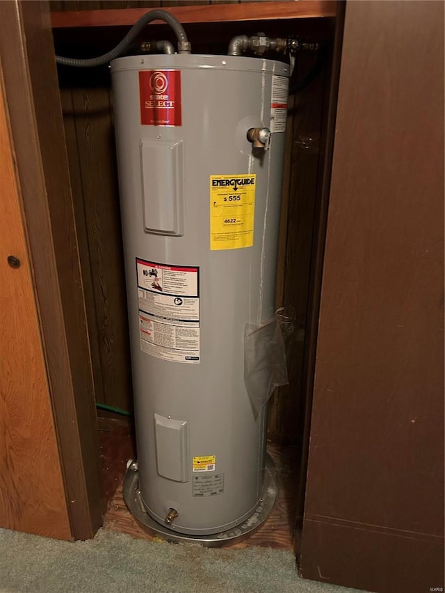 utility room with water heater