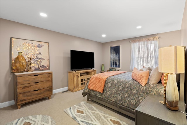 bedroom with recessed lighting, baseboards, and carpet floors