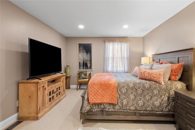 bedroom with recessed lighting, visible vents, light colored carpet, and baseboards