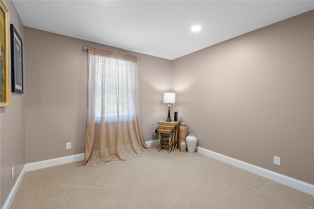 unfurnished room featuring recessed lighting, baseboards, and carpet floors