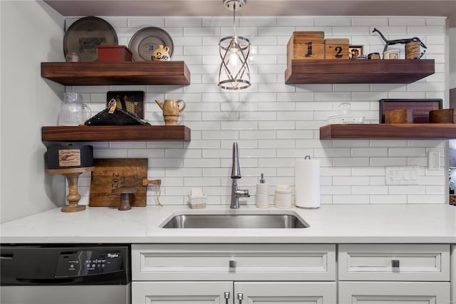 kitchen with a sink, stainless steel dishwasher, decorative backsplash, and open shelves