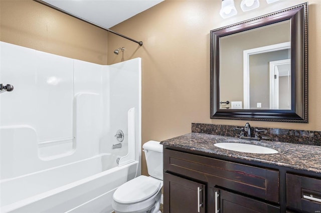 full bath with vanity, toilet, and shower / washtub combination