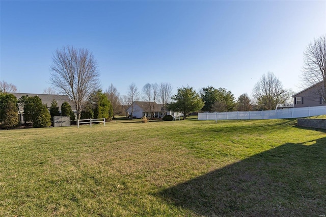 view of yard featuring fence