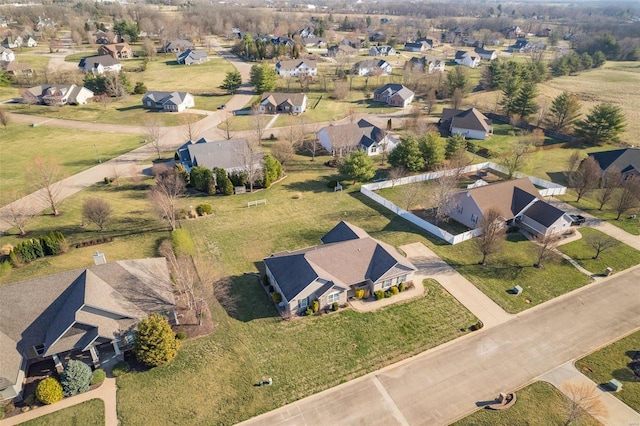 birds eye view of property with a residential view