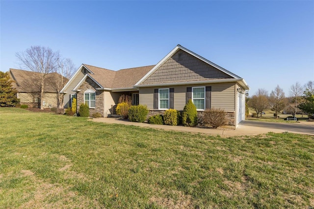 view of front of house with stone siding, an attached garage, concrete driveway, and a front lawn