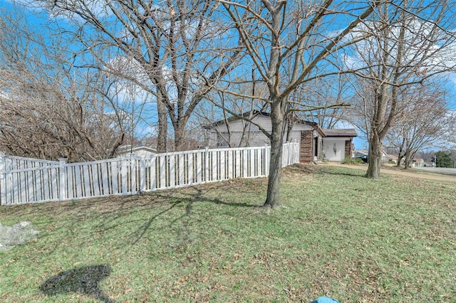 view of yard with fence