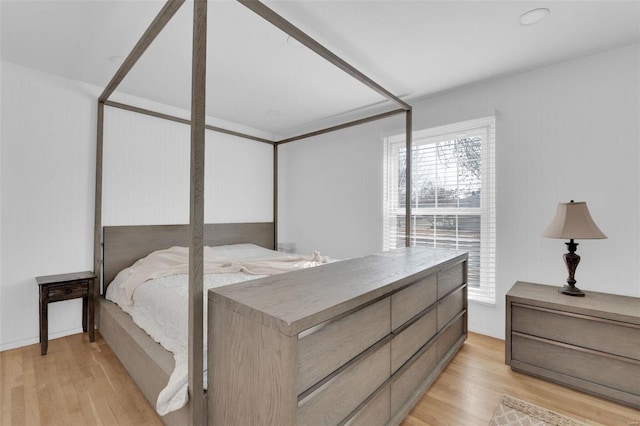 bedroom with light wood-type flooring