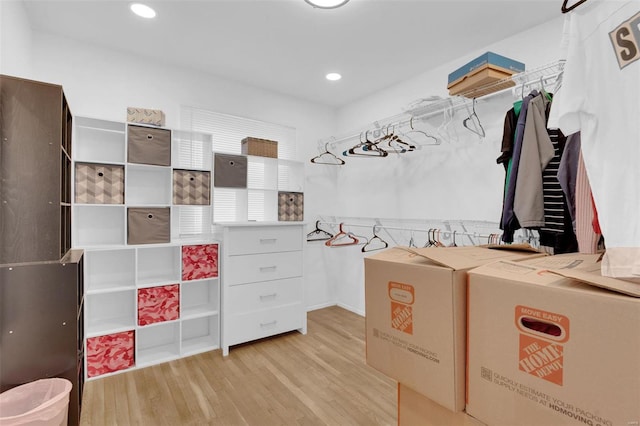 spacious closet with light wood-style flooring