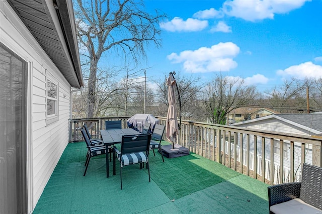 deck featuring outdoor dining area