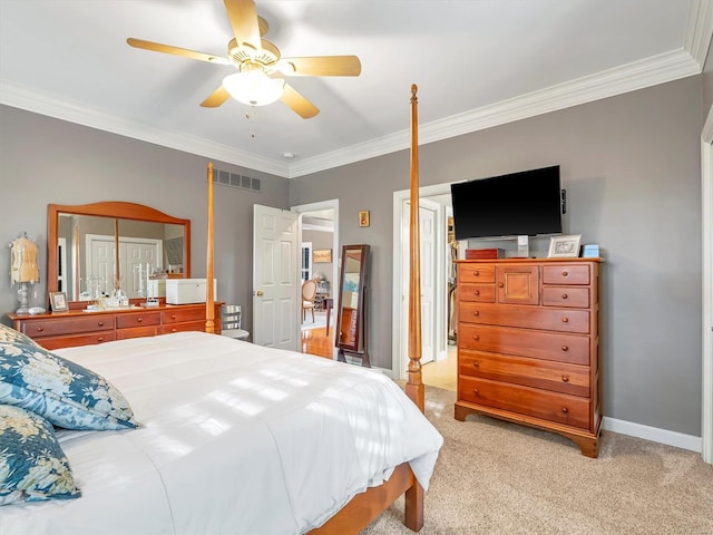 bedroom featuring baseboards, visible vents, ceiling fan, light carpet, and crown molding