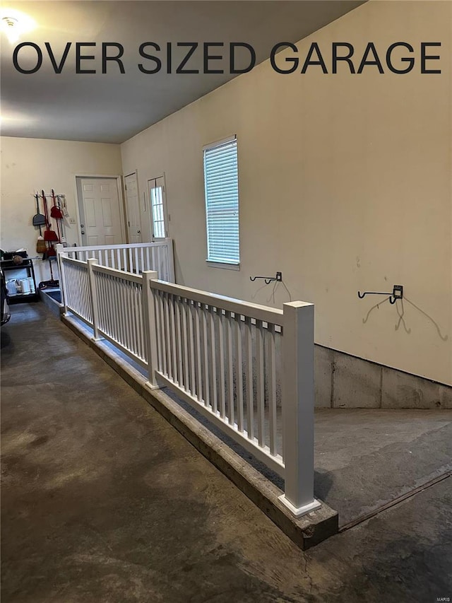 corridor with concrete floors