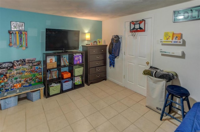 rec room with tile patterned floors