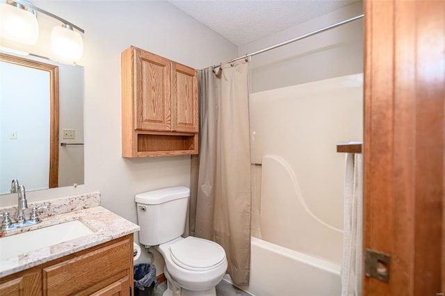 full bath with shower / tub combo with curtain, toilet, a textured ceiling, and vanity