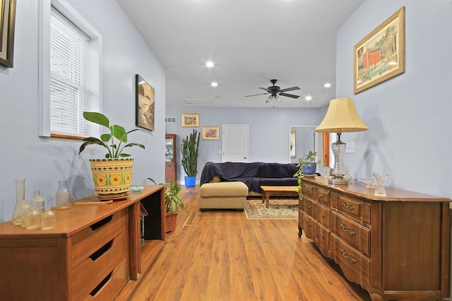 interior space with light wood-style flooring, recessed lighting, and ceiling fan