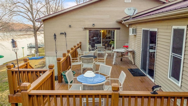 wooden deck with outdoor dining area