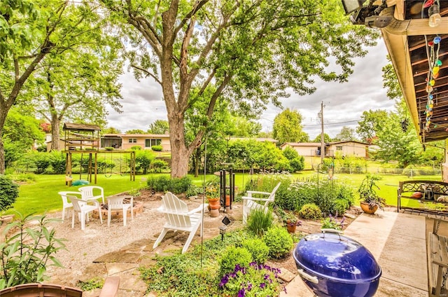 view of patio featuring an outdoor fire pit