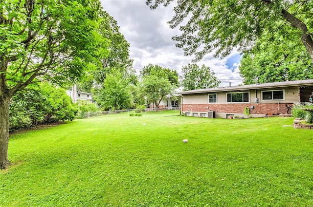 view of yard featuring fence