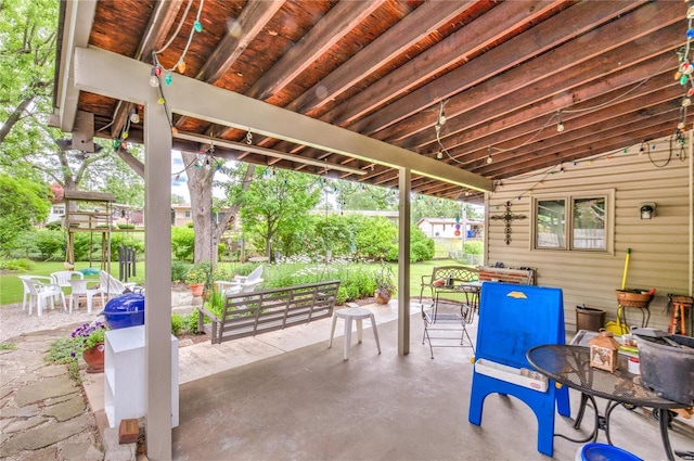 view of patio with outdoor dining area