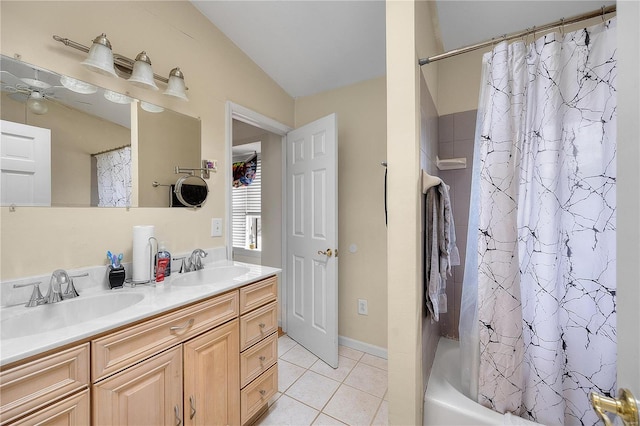 bathroom featuring a sink, shower / bath combo, a ceiling fan, and tile patterned flooring