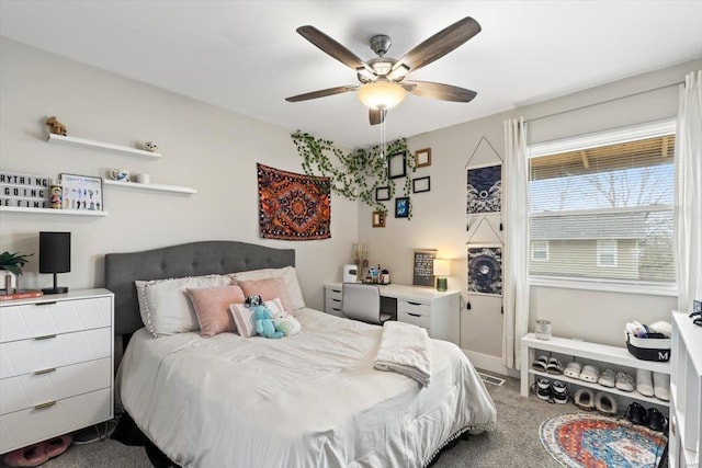 carpeted bedroom with ceiling fan