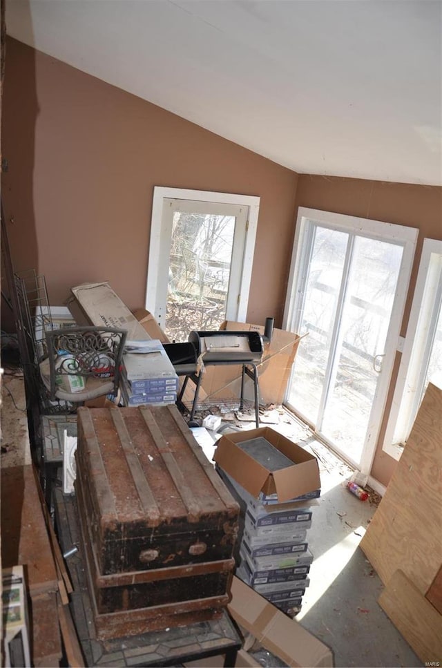 dining area with vaulted ceiling and a healthy amount of sunlight