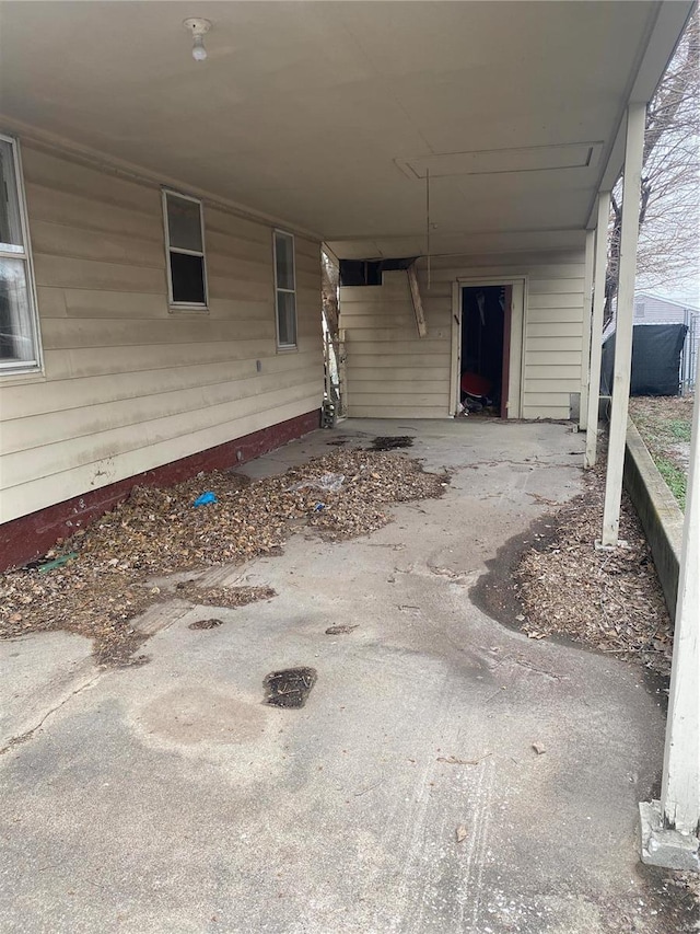 view of patio with an attached carport