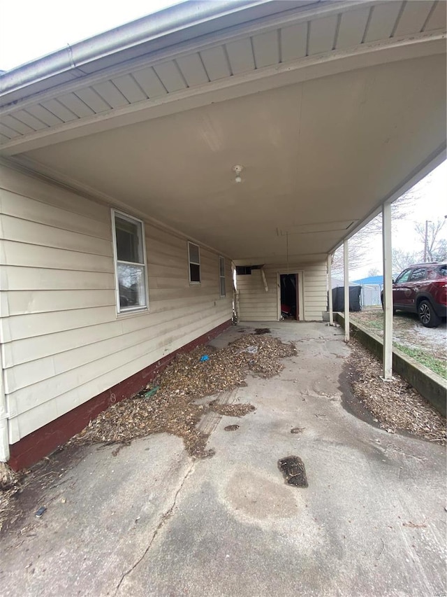 view of patio with an attached carport